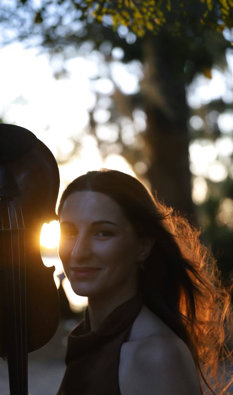 Portrait photograph of Tatev Muradyan with violin