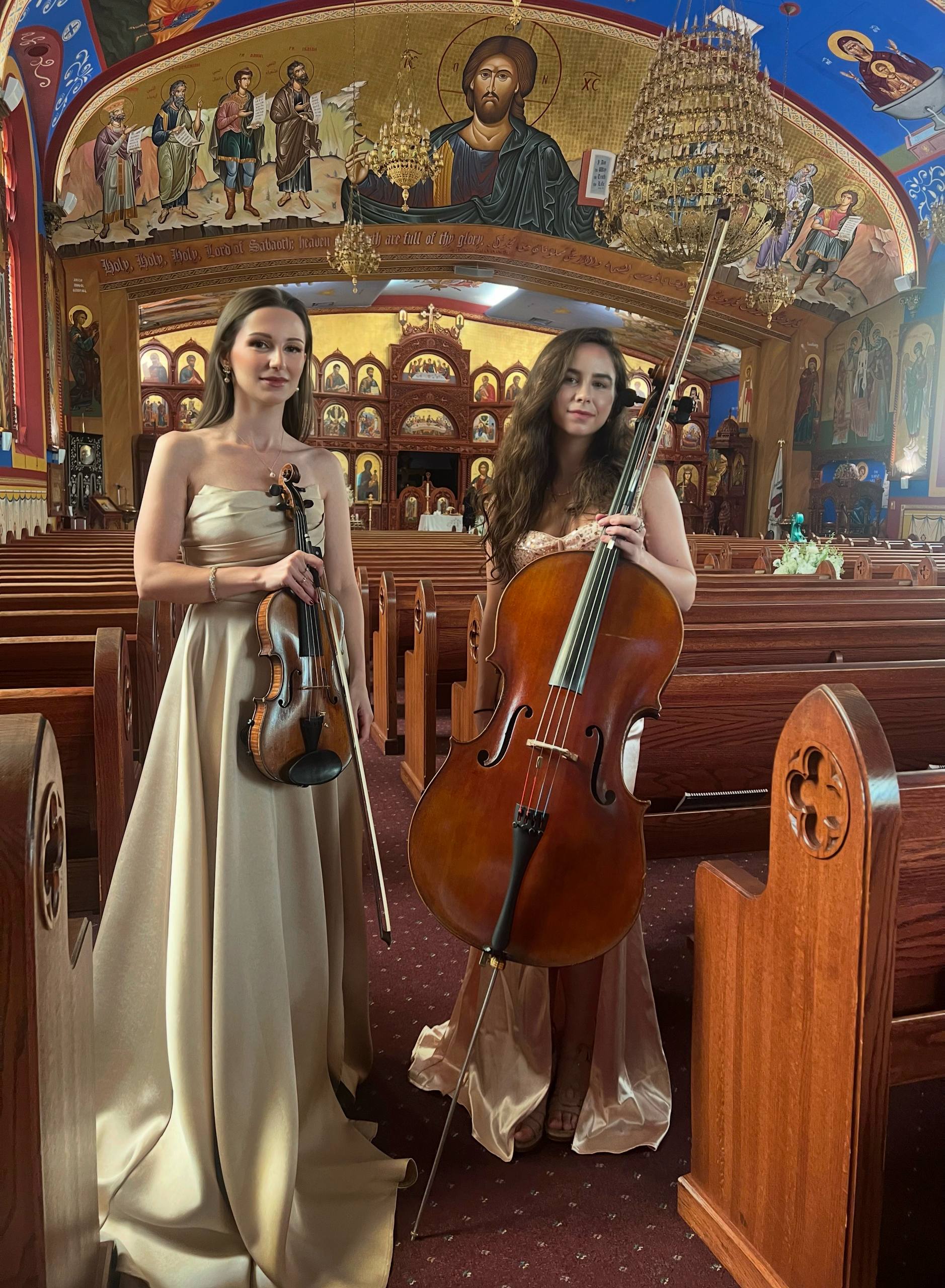 Tatev Muradyan with a cellist before a church ceremony