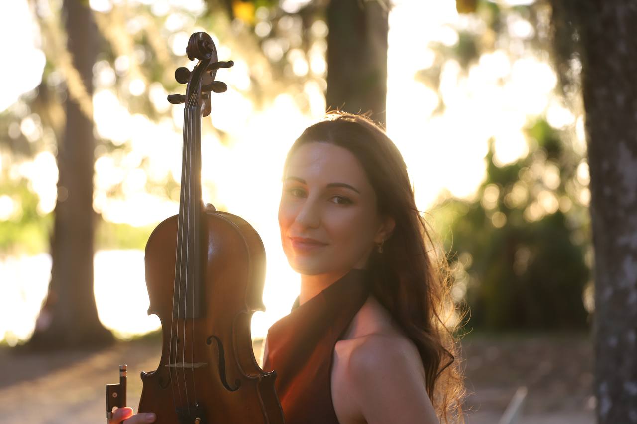 Portrait photograph of Tatev Muradyan with violin