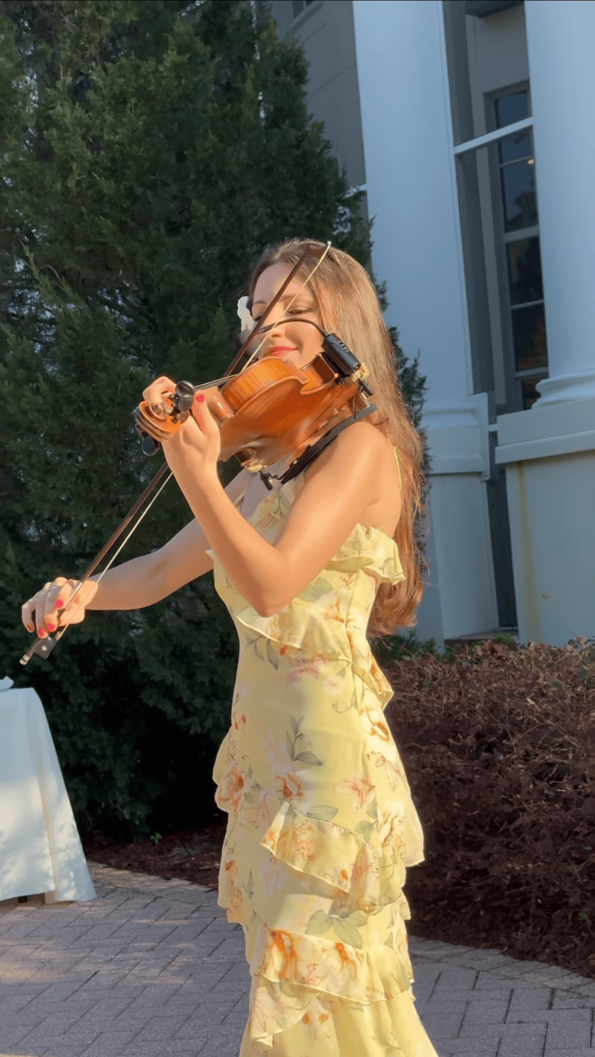 Portrait photograph of Tatev Muradyan with violin